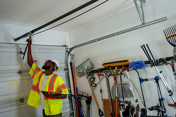 Professional Garage Door Panel Replacement technician working in Earle, AR